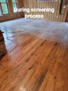 buffing out the hardwood floors in a Bloomingdale home